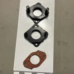 Datsun Roadster R16 Carburetor Insulators 16174-14600 & Gaskets New. Price: $225.00.