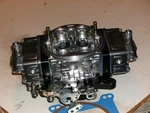 Holley, Qft 750 Hp Double Pumper, Roots Type Blower, Black Base & Met. Blocks New. Price: $779.00.