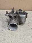 Antique 1930'S Vacturi 36D10 Outboard Boat Motor / Carburetor Assembly Used. Price: $120.00.
